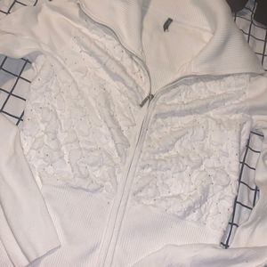 super cute white sweater with larger collar